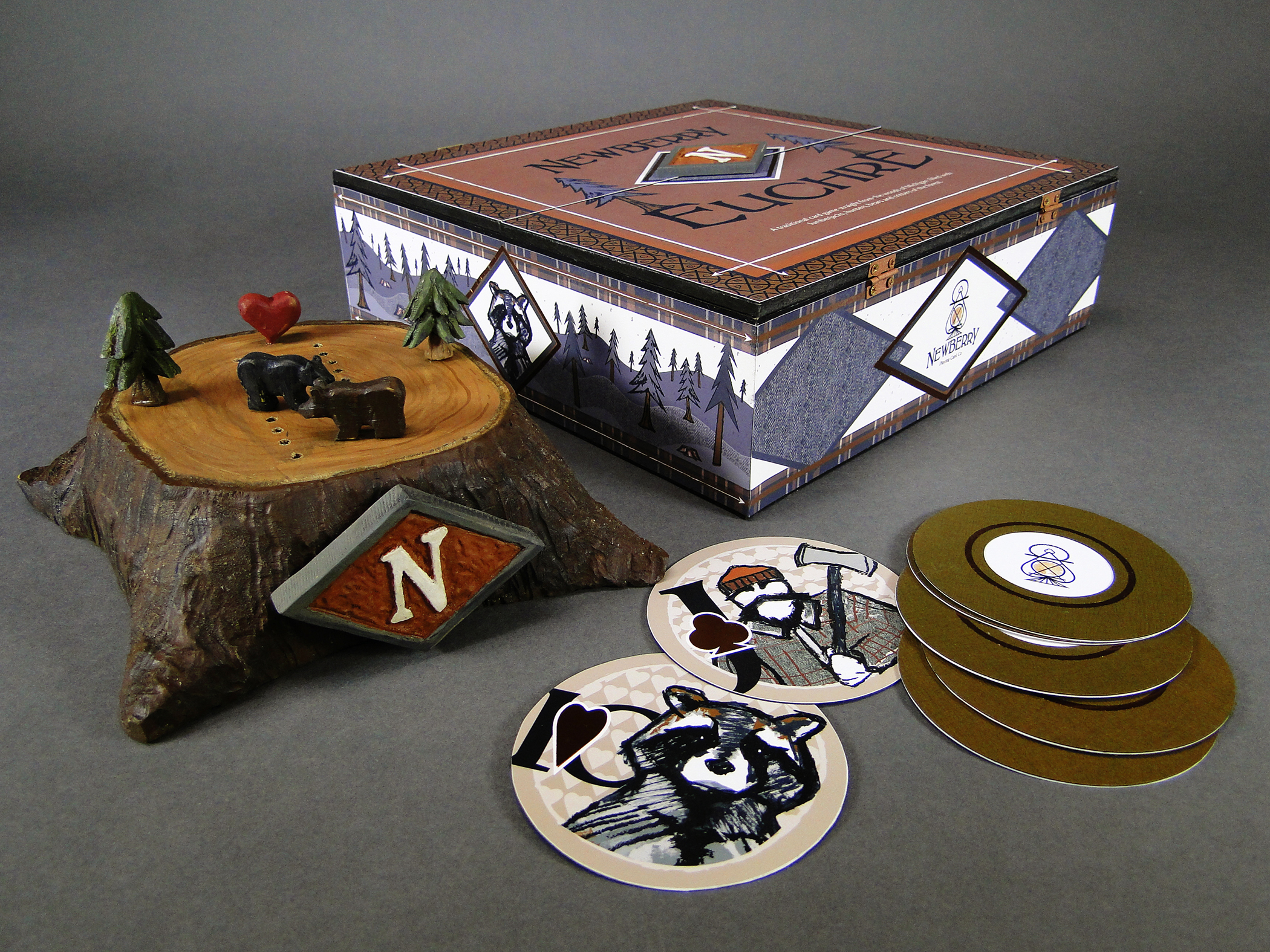 photo of all the game cards scoring pad and box